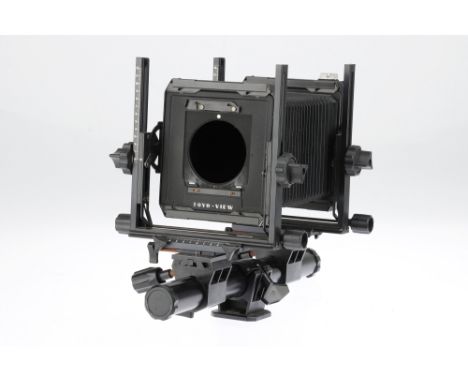 A Toyo-View C 4x5 Large Format Monorail Camera, black, in G condition, some rust to metal parts, bellows F-G, worn edges but 