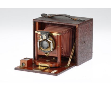 A Rochester Optical Premo A Hand and Stand Folding Plate Camera quarter plate, circa 1900, serial no.100519 with a Bausch &am