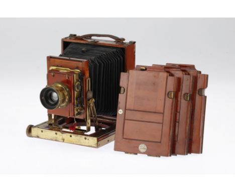 A Thornton Pickard Imperial Triple Extension Quarter Plate Camera mahogany and brass field camera, circa 1910-20, with a Dall