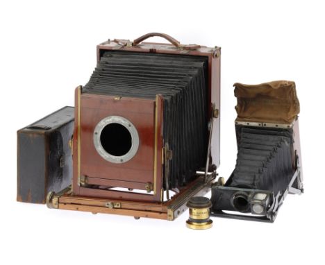 A Thornton Pickard Ruby Half Plate Field Camera circa 1900, square-cornered black bellows, triple extension, no lens fitted, 