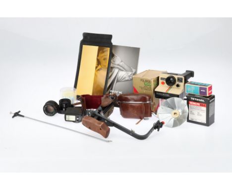 A Mixed Selection of Photographica, to include a stroboframe bracket, a Polaroid 1000, &amp; more,