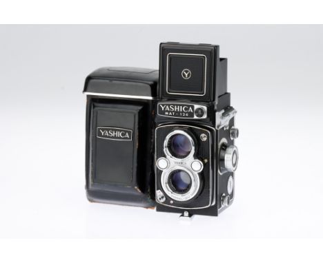 A Yashica Mat-124 Medium Format TLR Camera black, 1968, serial no.8060250, with a Yashinon f/3.5 80mm lens, shutter stuck clo