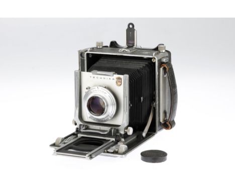 A Linhof Super Technika III Large Format Folding Camera, black, body F-G, well worn &amp; patina throughout, bellows F, requi