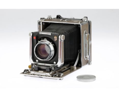 A Linhof Super Technika IV Large Format Folding Camera, tan &amp; chrome, body G, well used, some damage to leather trim, bel