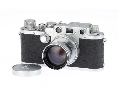 A leica IIIf 35mm Rangefinder Camera, 1951, serial no. 582194, chrome, body VG, shutter working but slow speeds require servi