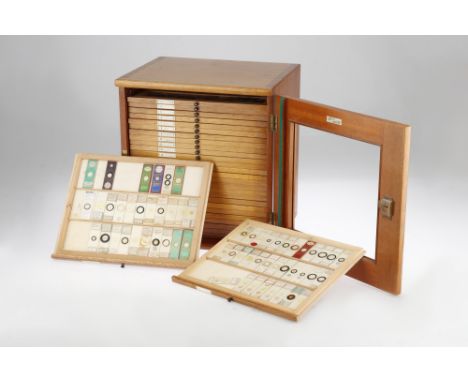 A Large Collection of Microscope Slides, large light wood cabinet with 28 drawers each capable of holding 3 rows of 12 slides