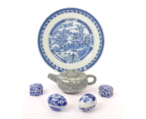 A collection of Chinese porcelain items to include a small crackle glaze teapot, a blue and white plate with oriental landsca