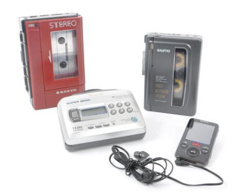 Sanyo / Aiwa - A collection of three cassette players to include Sanyo M1118 standard compact cassette voice recorder, Sanyo 