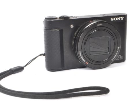 Sony - A Sony DSC-HX90V ( HX90V ) compact digital camera. The camera featuring an 18.2MP CMOS sensor couple with a 30x optica
