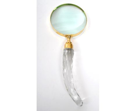 A 20th Century vintage brass cased large magnifying glass have cut glass handle. Measuring approximately 27.5cm x 10cm.