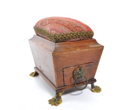 A George III early 19th century mahogany sewing companion / pin cushion. Sarcophagus form with drop in pin cushion to top, si