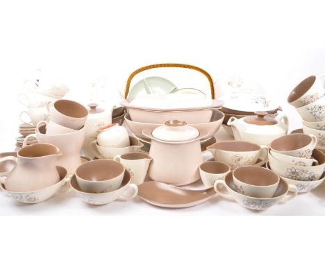 Poole Pottery - A large collection of mid 20th century Poole Pottery ceramic Twintone C54 tableware. The collection in the mu