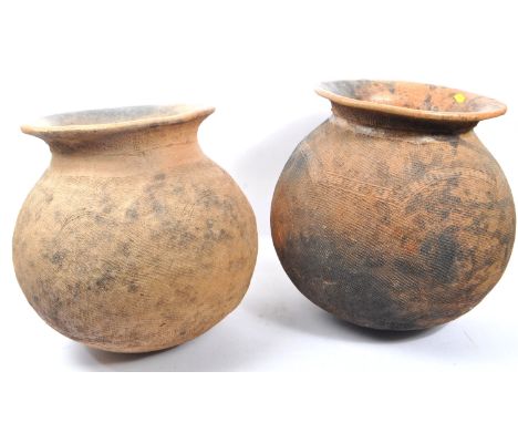 Two vintage 20th century African Kenyan clay pots / cisterns for water storage. Made by women in the Lake Victoria area in Ke
