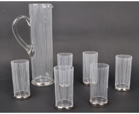 A mid 20th century striped lemonade / cocktail set. With a tall cylindrical decanter / jug with six matching drinking glass t