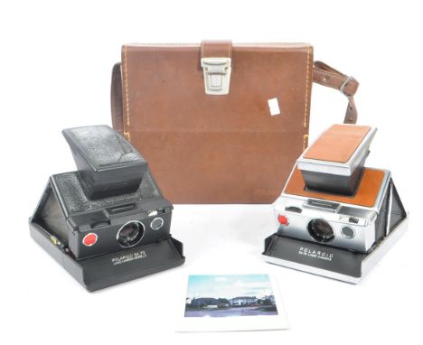 Polaroid - Two 20th century circa 1970s Polaroid SX-70 SLR instant land cameras. Each camera having a four element 116mm F/8 