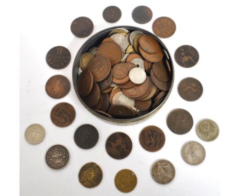 A collection of 18th, 19th &amp; 20th century British &amp; Foreign coins to include a 1927 Australia florin, 1701 gaming tok