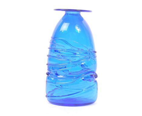 Neil Wilkin - A 20th Century 1980s studio art glass textured dark blue vase of ovoid form tapering to top with flared rim. Si