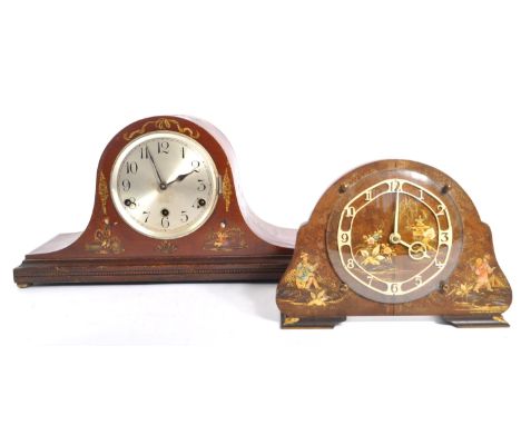 Two early 20th century British ' Japanned ' mantel clocks. The larger of the two clocks having a tambour style case with carv