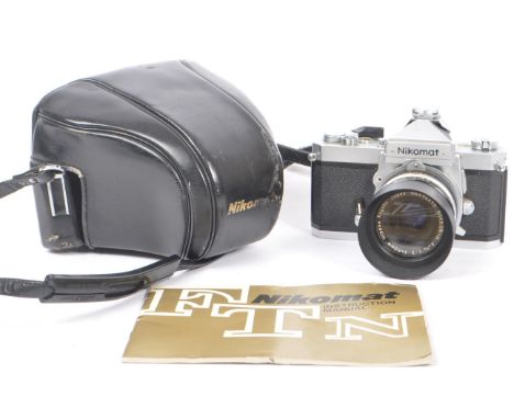 Nikomat FT - Vintage 20th century 35mm SLR film camera. With lens Nippon Kogaku Japan No. 696498 Nikkor - H auto 1:2 f = 50mm