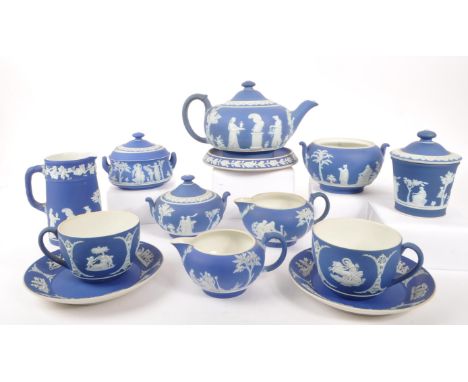 Wedgwood - An early 20th century Wedgwood Jasperware part tea service. The tea service to include a large teapot, four milk j