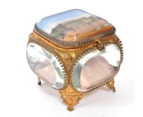 An early 20th Century bevelled glass and gilt metal French Parisian jewellery / pocket watch trinket box casket. Of square fo