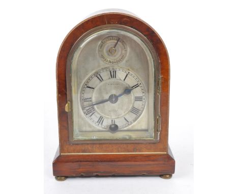 A 19th century Victorian Robert Stewart Scottish mantel clock. Having a domed top with silver face and Roman numeral chapter 