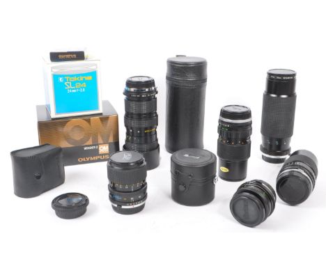 Olympus - A collection of mid 20th century Olympus O/OM mount lenses and accessories. The collection to include two Olympus Z