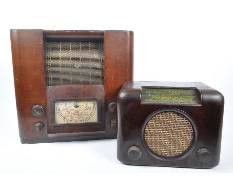 HMV - An early 20th century 1930s HMV #653 valve radio, alongside a later 1950s Bush DAC 90 valve radio. The HMV radio housed