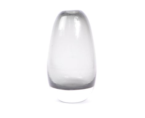 A mid 20th century studio art glass Scandinavian manner vase. The vase having a smoked glass body with clear base and folded 