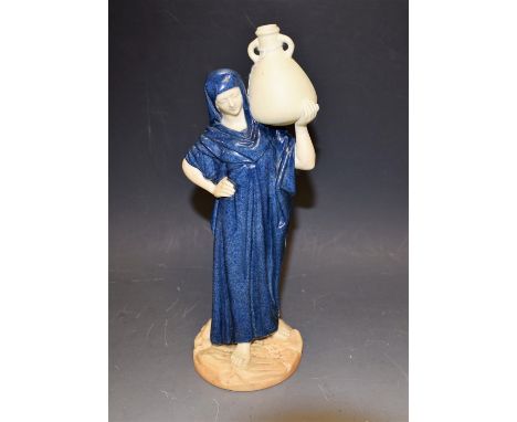A Royal Worcester Cairo water carrier figure, modelled by James Hadley, blue glazed gown, 25cm in height, backstamp for 1921