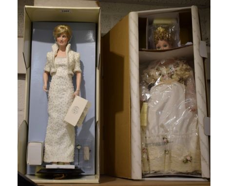 A Franklin Mint porcelain doll, Diana Princess of Wales, boxed; another, Hamilton Collection, Alexandra Last Empress of the R
