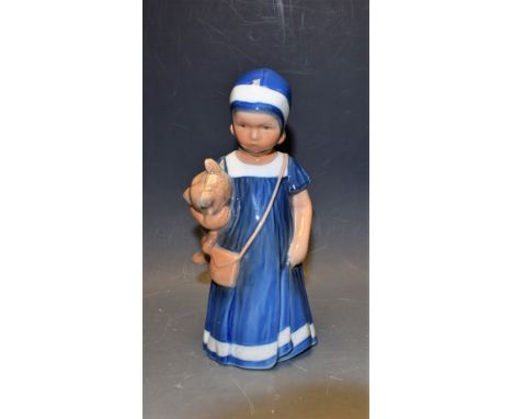 A Royal Copenhagen figure, Girl Holding a Teddy Bear