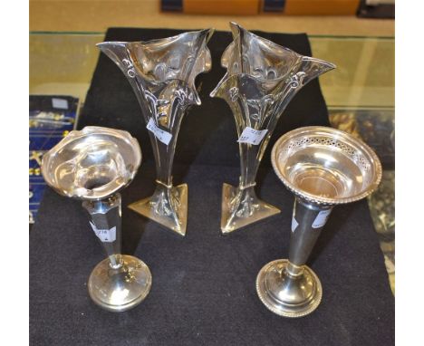 A pair of silver Art Nouveau triangular tapering trumpet vases, Birmingham 1903; others similar (4)