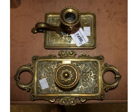 A Victorian brass inkstand; a brass dragon candlestick