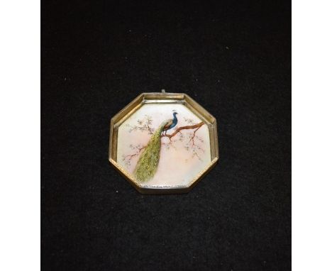 An enamel silver octagonal trinket dish, Walser Wald, internal body painted with a peacock upon a branch, stamped 925