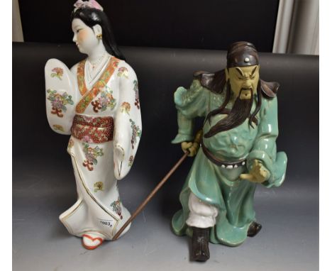 A Japanese Pottery figure samurai warrior, green robes, long beard; another Geisha girl (2) 