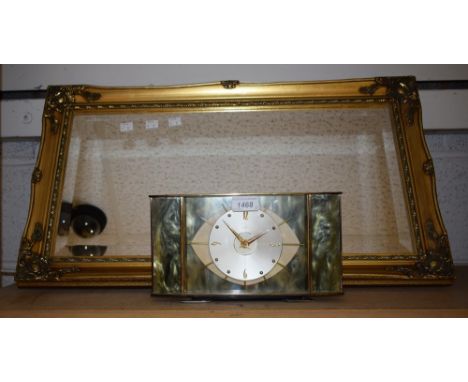 A 1950s/60s Metamec onyx effect eight day mantel clock, a gilt framed rectangular wall mirror (2)
