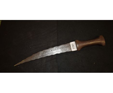 A 19th century North African/Middle Eastern kindjahl dagger, 26.5cm curved wavy blade inscribed with Arabic script, steel han