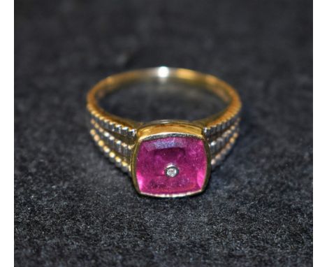 A Lehrer gentleman's ruby and diamond signet ring, rounded square cushion ruby, centre set with a single round brilliant cut 