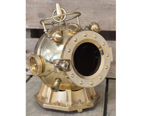 A Small Reproduction of a U.S. Navy Mark V deep-sea diving helmet Desk ornament in brass. 15cm in height. 