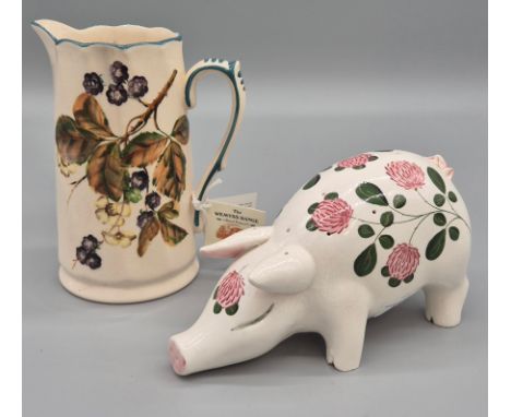 Griselda Hill Wemyss ware water jug- repaired. Together with a Wemyss Plitcha pottery pig. Jug- 21cm high &amp; pig- 23cm len