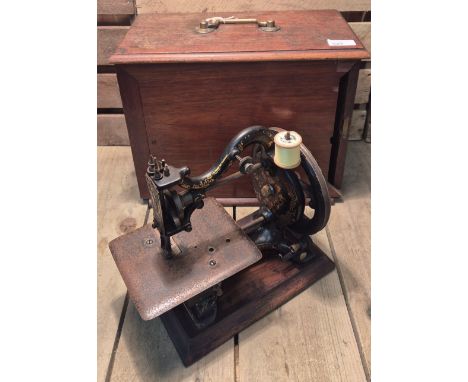 A Rare Maxfield "Agenoria" Works of Birmingham hand crank sewing machine. C1870'S. Comes with wooden carry case.