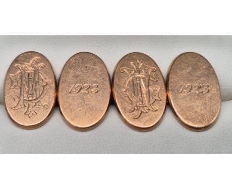 Pair of 9ct rose gold Birmingham marked cufflinks. Engraved with initials and dated 1923. 10.72 grams. 