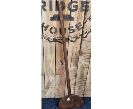 A 19th century long-handled adzed beech bread peel. 154cm length. 