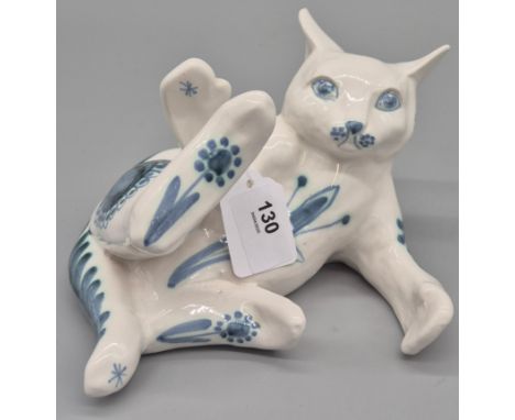 A large David Sharp Rye pottery cat in unusual reclining pose, stamped on underside. 17cm length.