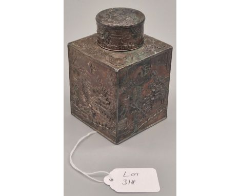 A late Qing Dynasty heavy copper tea caddy or canister of cuboid form, decorated all over with repoussé Willow pattern, the b