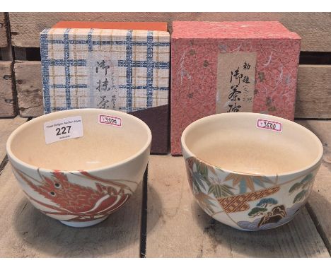 Two Japanese ceramic and hand painted bowls with boxes. Marking to the underside. 