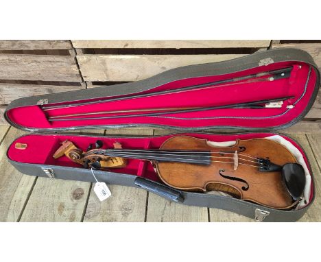 1870s Full Size Gebruder Wolff Violin with two bows. Comes with a fitted hard case. 358mm length of back. 