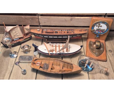 Tray of collectable nautical items; Brass tie off hook and Plaque. Ship in a bottle. Antique wooden ship model and various ot