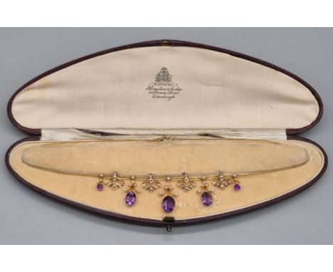Antique Edwardian Hamilton &amp; Inches of Edinburgh 9ct yellow gold, Amethyst and pearl set necklace. Set with three oval an